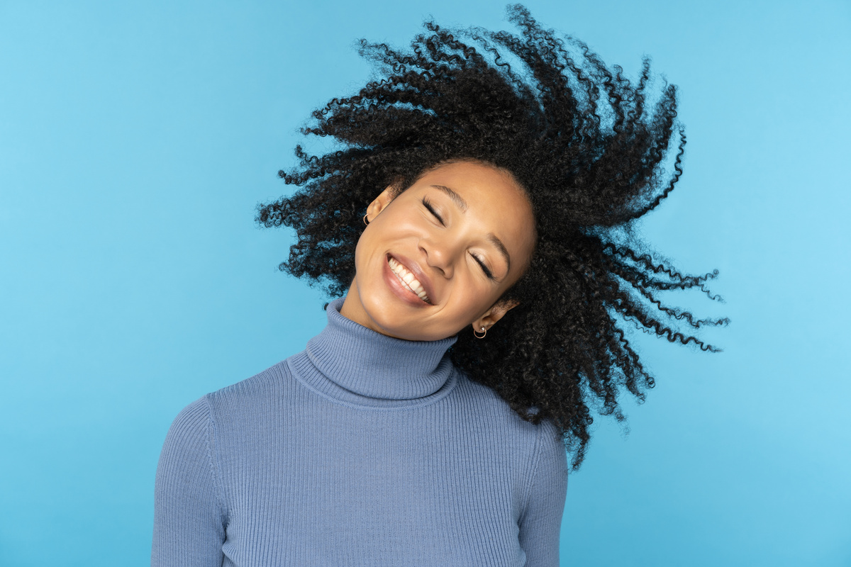 Woman Shaking Afro Hair 